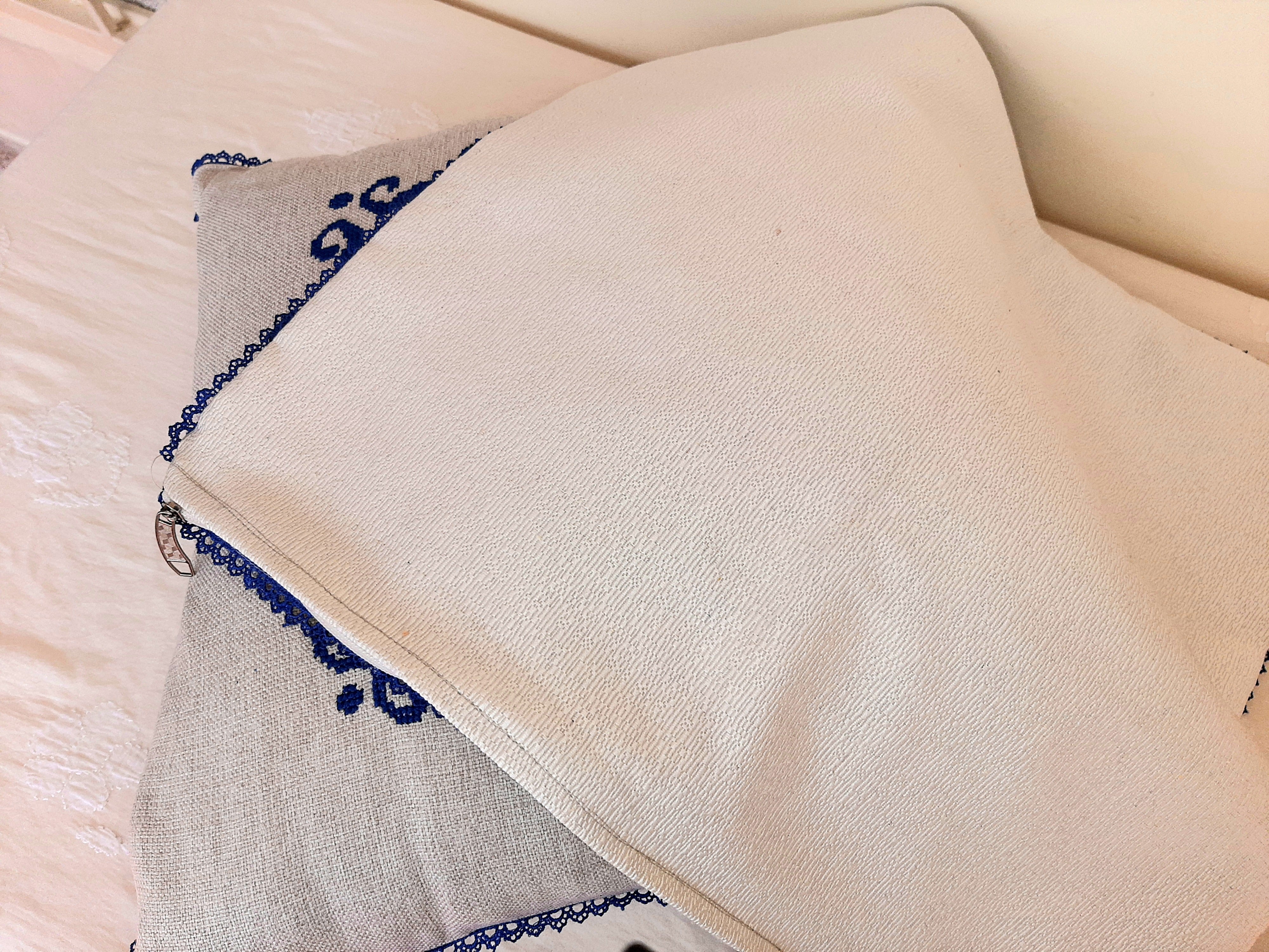 Wheel of Elegance - Hand Embroidered Blue Pattern on Silver Grey Jute Cushion