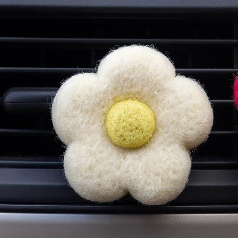 Car Air Vent Clip in the shape of white daisy from soft wool felt, vehicle air fresheners. Gift for car owner. 