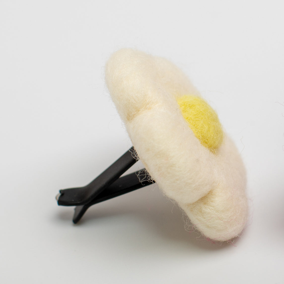 Car Air Vent Clip in the shape of white daisy from soft wool felt, vehicle air fresheners. Gift for car owner. 