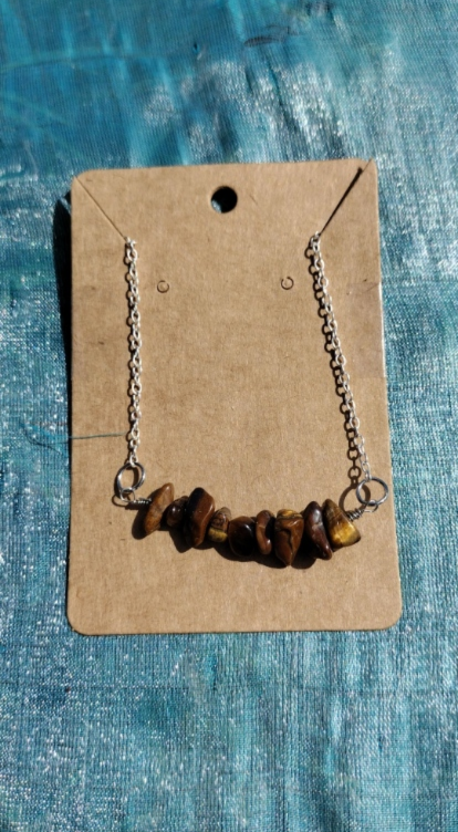tigers eye is known to help with grounding the spirit, inspire courage and confidence, and invite abundance.